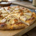carnivore pizza crust baked golden and crispy on a wooden board