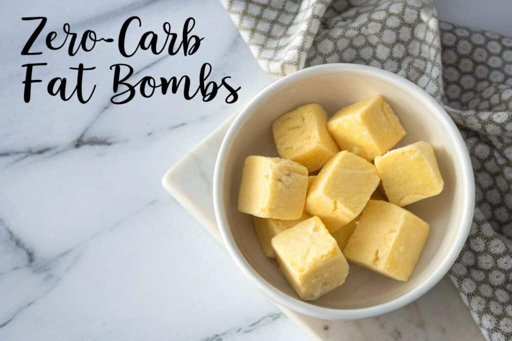 frozen yolk and cream custard cubes on marble surface